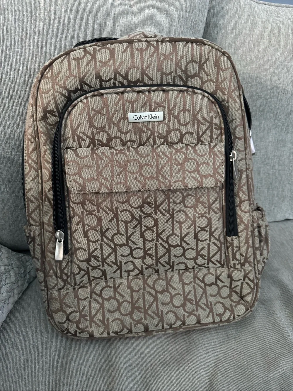 Calvin Klein Beige & Brown Monogram Backpack. Excellent condition.